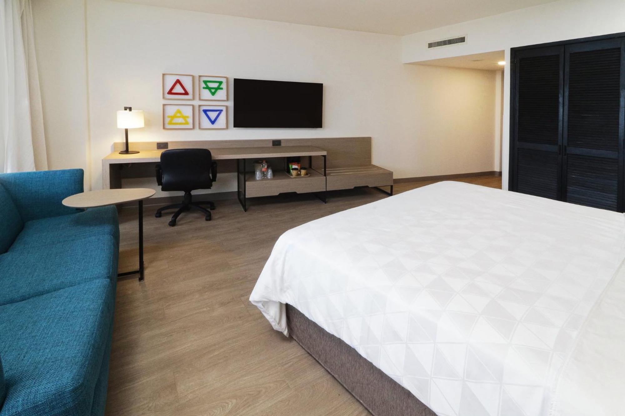 Holiday Inn Monterrey-Parque Fundidora By Ihg Exterior foto A room at the Hilton Garden Inn